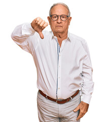 Senior caucasian man wearing business shirt and glasses looking unhappy and angry showing rejection...
