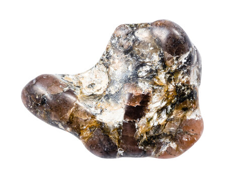 close up of sample of natural stone from geological collection - tumbled andalusite mineral isolated on white background from Andalusia, Spain