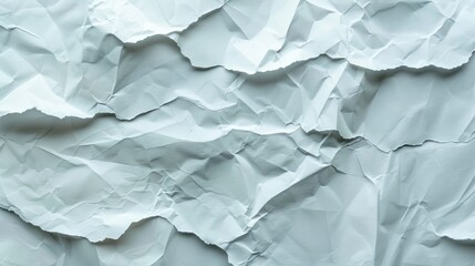Obraz premium Crumpled blank white paper on textured background.