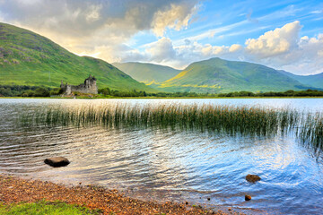 View of Kilchurn Castle on Lock Awe in the highlands of Scotland at sunset