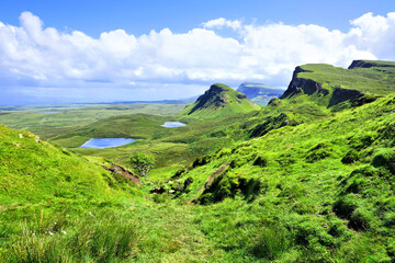 Isle of Skye, Scotland. View over the green mountain highland landscape of the Quiraing.