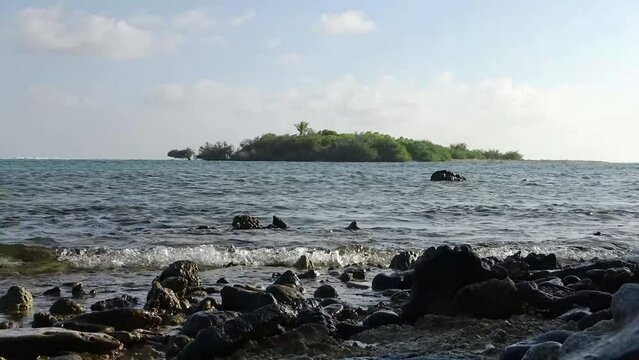 Time lapse of the ocean off a small island in the Maldives.