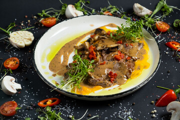 Tender veal with mushrooms is served in deep dish, filled with thick fragrant gravy. Tender meat is...