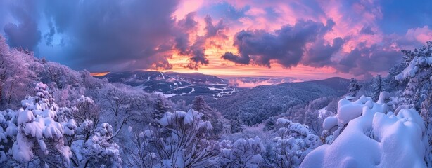 A vibrant sunset casting warm hues over a snow-covered mountain range, creating a striking contrast between the white snow and colorful sky