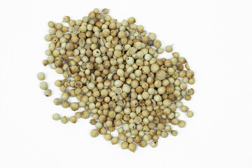 Close up of Dried Coriander seeds isolated on white background. Top view