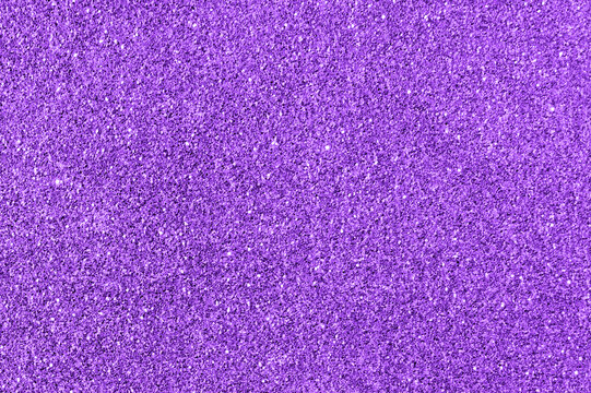 Purple glitter texture background. New Year, Christmas and all celebration background concepts.	