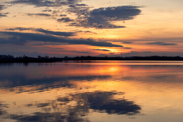 reflection of the sky in the lake at sunset
