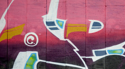 Colorful background of graffiti painting artwork with bright aerosol outlines on wall. Old school...