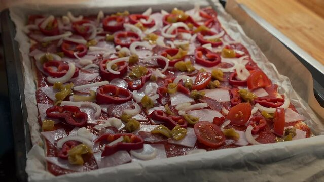 Top a homemade pizza with fresh ingredients