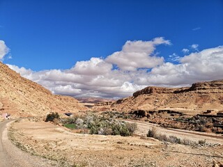 A blue sky with scattered clouds on a beautiful sunny day