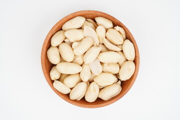 Baked peanut put on a wooden bowl Isolated Background