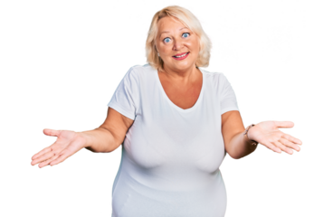 Middle age blonde woman wearing casual white t shirt smiling cheerful offering hands giving assistance and acceptance.