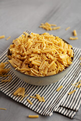 Dry Assorted Italian Pasta in a Bowl, side view.