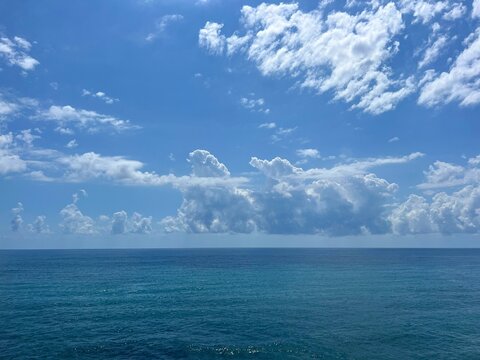 Blue sea and amazing clouds in the sky 