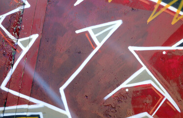 Colorful background of graffiti painting artwork with bright aerosol outlines on wall. Old school...