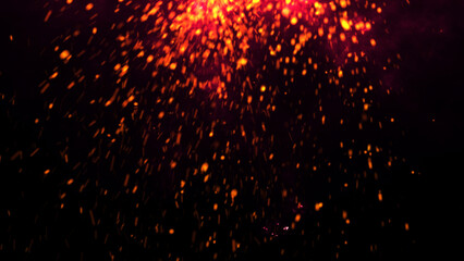 Dark Glitter Fire Lights Rise Through Smoke, Fog, and Misty Texture Over Black Background, Burning Sparks in this Abstract Composition, Red Glowing Ember Particles.