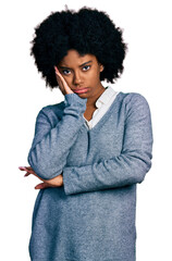 Young african american woman wearing business clothes thinking looking tired and bored with...