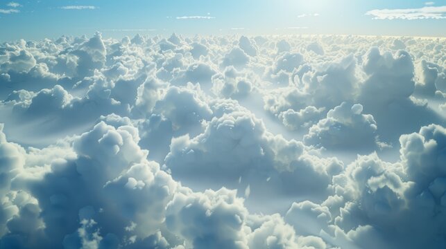 Aerial view of dense cloud formation with sunlight filtering through.