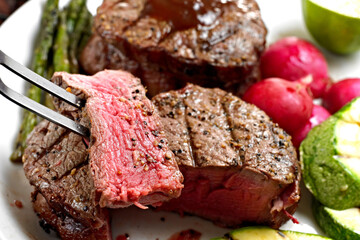 Close-Up 4K Ultra HD Image of Grilled Juicy Sirloin Steak with Potatoes in plate - Stock Photography