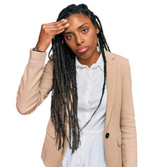 African american woman wearing business jacket worried and stressed about a problem with hand on forehead, nervous and anxious for crisis
