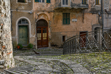 An uphill alley in the so-called "village of witches", famous for the witch trials dating back to the 16th century, Triora, Imperia, Liguria, Italy