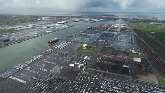 Aerial top view of new cars parking for sale.