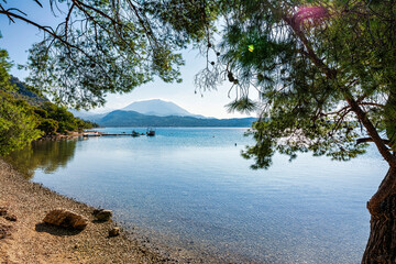 On a sunny day in Greece, Vouliagmeni Lake near Loutraki is a beautiful sight to behold.