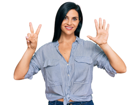 Young caucasian woman wearing casual clothes showing and pointing up with fingers number seven while smiling confident and happy.