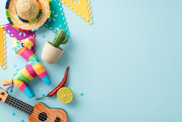 Top view shot of Cinco de Mayo decorations: hat, a vihuela, cactus in a pot, a colorful pinata,...