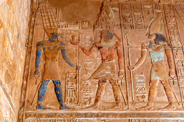 Remnants of Painted Ceremonial Carvings of Pharaohs on the Walls of the Karnak Temple Complex, Luxor, Egypt - 765934504