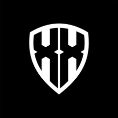 XX monogram logo with bold letters shield shape with black and white color design