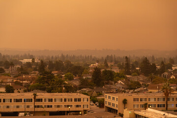 Looking Out Over Redwood City, California, San Francisco Bay Area With Smoggy, Smoky Orange Skies Caused by Out of Control Wildfires Caused by Drought and Climate Change - 765935973