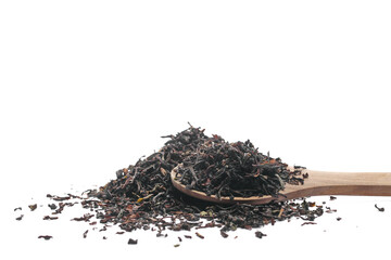 Heap Darjeeling Tea dried tea leaves in wooden spoon isolated on white, close up, side view