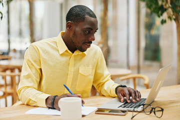 Black man laptop businessman smart office work sitting business male computer young person professional