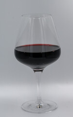 Isolated glass of red wine