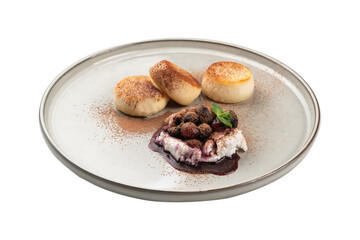 cheesecakes with dessert on an isolated white background in a plate