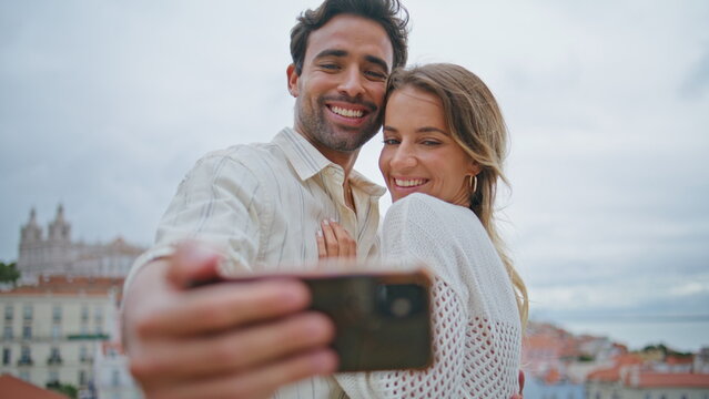 Happy couple taking selfie photo on sea vacation closeup. Lovers enjoying date