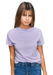 Fototapeta premium Teenager caucasian girl wearing casual clothes skeptic and nervous, frowning upset because of problem. negative person.