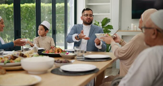 Muslim, family and friends with food or lunch at dining table for eid, islamic celebration or hosting. Ramadan, culture and children eating at religious gathering with dinner, discussion or happiness