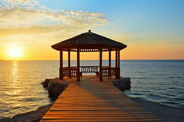 Peaceful seaside gazebo at sunset with calm ocean - Powered by Adobe