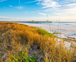 Sand Dunes and Wooden Pier on Fernandina Beach, Amelia Island, Florida, USA