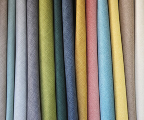 Upholstery textile materials variety selection of designs and colors. Design clothes concept idea. Modern and classic cloth samples 