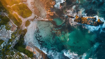 Rolgordijnen Camps Bay Beach, Kaapstad, Zuid-Afrika A stunning aerial photo of Maiden's Cove Tidal Pool at sunset, with Camps Bay in the background, Cape Town, South Africa.