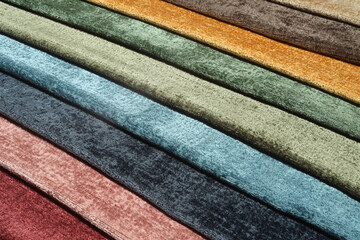 Upholstery textile materials variety selection of designs and colors. Design clothes concept idea. Modern and classic cloth samples 