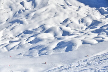Fototapeta na wymiar Ski slopes of Courchevel ski resort by winter
