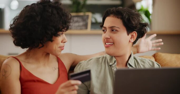 Home, laptop and lesbian couple with a credit card, savings and excited with transactions and budget planning. Queer people, apartment and women with a computer and ecommerce with conversation or app