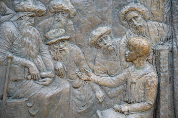 The Finding of Jesus in the Temple – Fifth Joyful Mystery of the Rosary. A relief sculpture on Mount Podbrdo (the Hill of Apparitions) in Medjugorje.