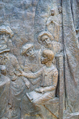 The Finding of Jesus in the Temple – Fifth Joyful Mystery of the Rosary. A relief sculpture on Mount Podbrdo (the Hill of Apparitions) in Medjugorje.