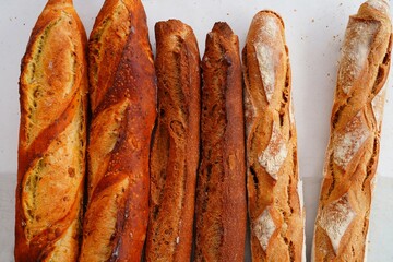 View of crusty French baguette bread loaves - 765971350