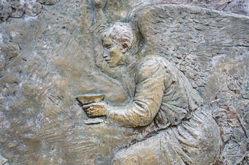The Agony of Jesus in the Garden – First Sorrowful Mystery of the Rosary. A relief sculpture on Mount Podbrdo (the Hill of Apparitions) in Medjugorje.